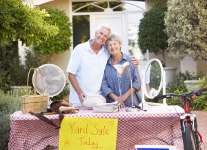 42248295 - senior couple holding yard sale